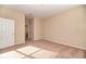 Comfortable bedroom with neutral carpet, paint, and trim at 12091 Firewheel Pl, Venice, FL 34293