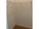 Walk-in closet featuring carpeted floors and ample shelving for storage and organization at 12091 Firewheel Pl, Venice, FL 34293