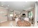 Comfortable clubhouse living room area with neutral tones, modern decor, and ample seating at 12091 Firewheel Pl, Venice, FL 34293