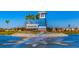 Stunning community entrance with a beautiful water feature, a vibrant flower bed, and prominent signage at 12108 Kingsley Trl, Parrish, FL 34219