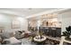 Inviting living room open to dining room and kitchen bar area, perfect for modern living at 1227 Porpoise Rd, Venice, FL 34293