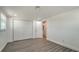 Spacious main bedroom featuring large closet, ensuite bathroom and light-colored floors at 1227 Porpoise Rd, Venice, FL 34293