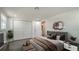 Comfortable main bedroom with ensuite bathroom, closet and neutral decor at 1227 Porpoise Rd, Venice, FL 34293