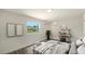 Bright main bedroom features stylish decor, a vanity, and a backyard view at 1227 Porpoise Rd, Venice, FL 34293