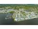 Aerial view of mobile homes and boat docks on a waterfront at 13 Oak St, Bradenton, FL 34208