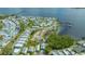 Aerial view of mobile homes and docks on the water at 13 Oak St, Bradenton, FL 34208