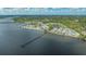 Waterfront community featuring a long pier, ideal for enjoying waterfront living and outdoor recreation at 13 Oak St, Bradenton, FL 34208