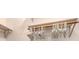 A close-up of the closet, featuring clothing hangers on a rail at 13 Oak St, Bradenton, FL 34208