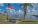 Waterfront community park featuring picnic tables, a pier, and scenic views on a sunny day at 13 Oak St, Bradenton, FL 34208