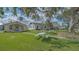 Charming community with picnic tables offering a perfect spot for gatherings and relaxation amidst a serene environment at 13 Oak St, Bradenton, FL 34208