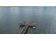 Aerial view of the fishing pier with benches for residents in Historic Braden Castle at 13 Oak St, Bradenton, FL 34208