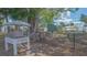 Outdoor display of model home and signage near historic Braden Castle Ruins in a grassy area at 13 Oak St, Bradenton, FL 34208