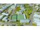Aerial view of shuffleboard courts surrounded by charming homes in Historic Braden Castle at 13 Oak St, Bradenton, FL 34208
