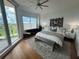 Bright bedroom with a seating area and a beautiful view at 130 Riviera Dunes Way # 304, Palmetto, FL 34221