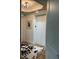 Hallway view of the elevators and decorative rug leading to the apartment homes at 130 Riviera Dunes Way # 304, Palmetto, FL 34221