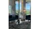 Inviting living room with stylish decor and a balcony view at 130 Riviera Dunes Way # 304, Palmetto, FL 34221