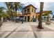 Charming outdoor restaurant with comfortable seating and lush landscaping offers a relaxing experience at 130 Riviera Dunes Way # 304, Palmetto, FL 34221