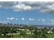Scenic views of the coastline featuring lush palm trees and a bridge at 130 Riviera Dunes Way # 304, Palmetto, FL 34221