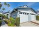 Charming home with two-car garage, manicured landscaping, and stunning architectural details at 1311 Siesta Bayside Dr # 1311-A, Sarasota, FL 34242
