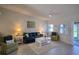 Bright living room featuring modern decor, plush seating, and ample natural light at 1311 Siesta Bayside Dr # 1311-A, Sarasota, FL 34242