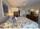 Inviting main bedroom with views, comfortable bedding, and ample closet space for storage at 1311 Siesta Bayside Dr # 1311-A, Sarasota, FL 34242