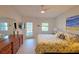 Serene main bedroom with private access to the outside and serene water views at 1311 Siesta Bayside Dr # 1311-A, Sarasota, FL 34242