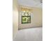 Cozy bedroom with a bright window and neutral paint at 13511 4Th Plz E, Bradenton, FL 34212