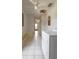 Hallway showing water damage to the ceiling at 1450 Aqui Esta Dr, Punta Gorda, FL 33950