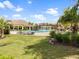 Inviting community pool with waterfall feature, perfect for relaxation and recreation at 16904 Vardon Ter # 201, Bradenton, FL 34211