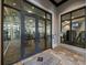 View of the community fitness center showcasing modern exercise equipment and large windows at 16904 Vardon Ter # 201, Bradenton, FL 34211
