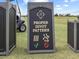 Sign demonstrating the proper golf divot replacement pattern on the community's golf course at 16904 Vardon Ter # 201, Bradenton, FL 34211