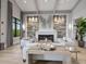 Comfortable lounge area with cozy seating, fireplace, contemporary decor, and ample natural light at 16904 Vardon Ter # 201, Bradenton, FL 34211