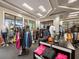 Pro shop with a variety of golf apparel and accessories on display tables and clothing racks at 16904 Vardon Ter # 201, Bradenton, FL 34211