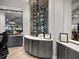 Modern wine storage room featuring stylish racking, climate control, and elegant display at 16904 Vardon Ter # 201, Bradenton, FL 34211