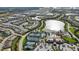 Aerial view of the community featuring beautiful lakes, tennis courts, pool, and a clubhouse at 17905 Waterville Pl, Bradenton, FL 34202