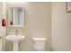 Powder room features pedestal sink, square mirror and fixtures at 17905 Waterville Pl, Bradenton, FL 34202
