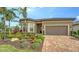 Charming home boasts vibrant landscaping, well-manicured lawn, and inviting curb appeal at 17905 Waterville Pl, Bradenton, FL 34202
