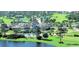 Resort-style clubhouse with pool, golf course, and manicured landscaping in a beautiful community at 1831 San Silvestro Dr, Venice, FL 34285