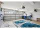 Spacious garage with ample storage space, featuring an automatic door and room for multiple vehicles or projects at 1831 San Silvestro Dr, Venice, FL 34285