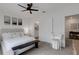 Inviting bedroom with white walls, comfortable bed, modern furniture, and calming decor at 1860 Pleasant Maple Ct, Bradenton, FL 34211