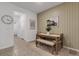 Dining area with wood table, bench seating, neutral rug, and decorative wall art at 1860 Pleasant Maple Ct, Bradenton, FL 34211