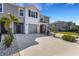 Charming townhome featuring neutral tones, attached garage, and well-maintained landscaping at 1860 Pleasant Maple Ct, Bradenton, FL 34211