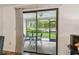 View of the patio with outdoor seating at 1930 Peppermill Dr, Clearwater, FL 33763