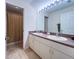 Bathroom with double sinks, spacious vanity and shower with neutral colors at 2160 Brandon Park Cir, Brandon, FL 33510