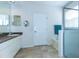 Neutral bathroom featuring a shower, soaking tub, vanity with storage, and tile flooring at 2160 Brandon Park Cir, Brandon, FL 33510