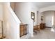 Bright entryway features staircase with safety gate, archways, and direct access to living area at 2160 Brandon Park Cir, Brandon, FL 33510