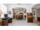 Spacious living room with classic wood furnishings, large windows, and an open floor plan at 2160 Brandon Park Cir, Brandon, FL 33510