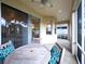 Covered patio with dining table, ceiling fan, and view of the backyard at 2160 Brandon Park Cir, Brandon, FL 33510