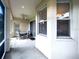 Enclosed patio with dining table, ceiling fan and screened windows at 2160 Brandon Park Cir, Brandon, FL 33510