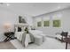 Serene bedroom with soft lighting, plush rug, and neutral decor creates a relaxing atmosphere at 2182 Wisteria St, Sarasota, FL 34239